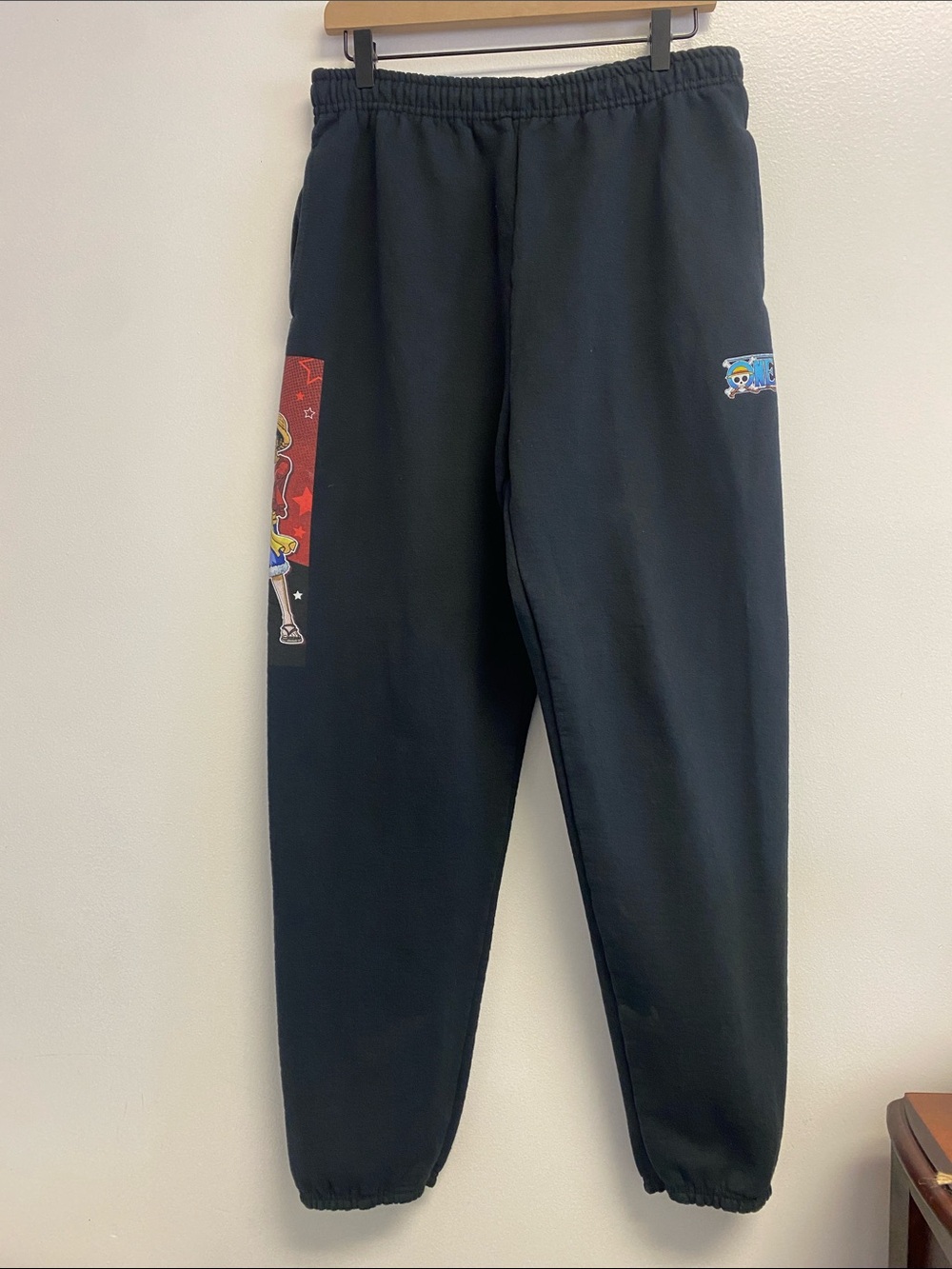 Onepiece Black Sweatpants with Colorful Cartoon Side Panels